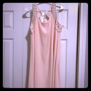 Beautiful pink knee length dress with arm detail